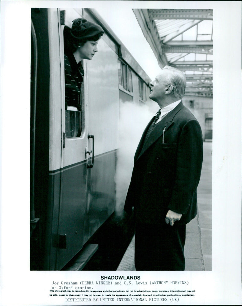 Actors Debra Winger and Anthony Hopkins at Oxford station for the filming of Shadowlands. - Vintage Photograph