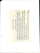 Sir Leslie Rowan, chairman of Vickers Ltd, inspects a 303 inch medium machine gun after 55 years of service with the Army. - Vintage Photograph