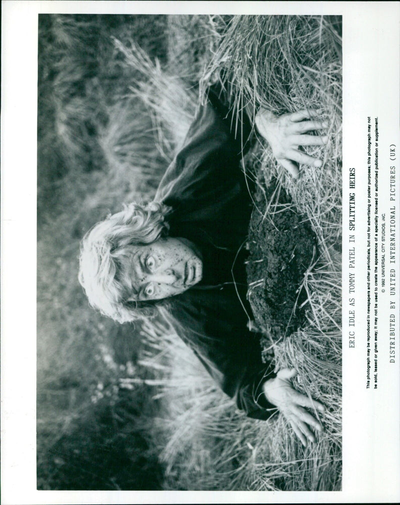 Eric Idle as Tommy Patel in the movie Splitting Heirs. - Vintage Photograph