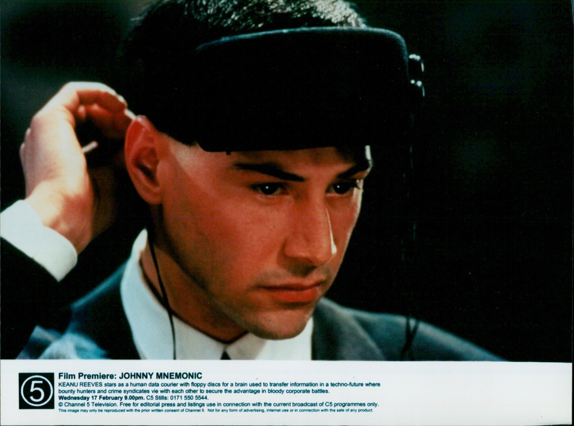 Actor Keanu Reeves poses on the red carpet at the film premiere of