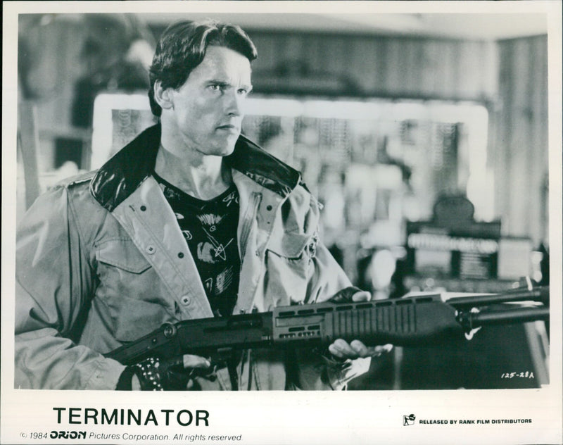 Arnold Schwarzenegger and Michael Biehn in the 1984 science fiction action film "The Terminator." - Vintage Photograph