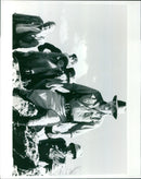 Students gather to watch a screening of "Ten Little Indians" at the Page 19 Filmshils in VA. - Vintage Photograph