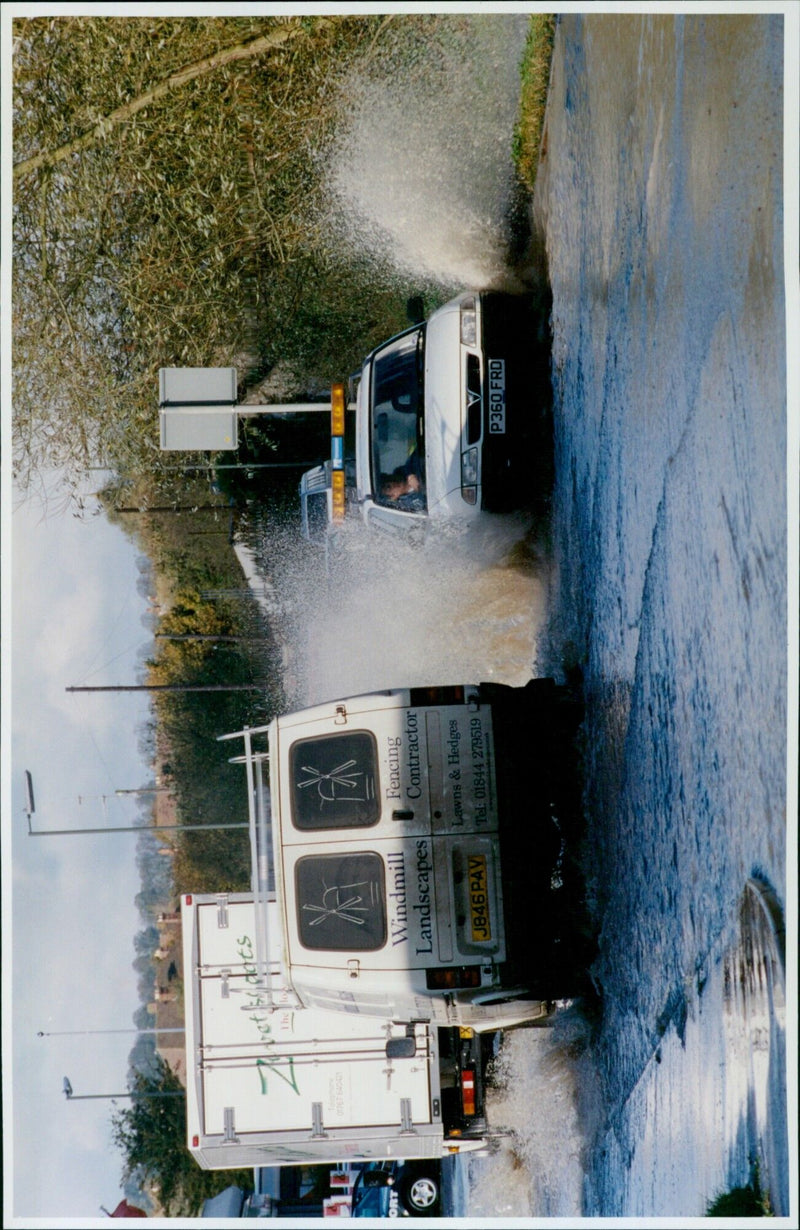 Floodwaters submerge a road near the Asda store in Wheatley, Oxfordshire. - Vintage Photograph