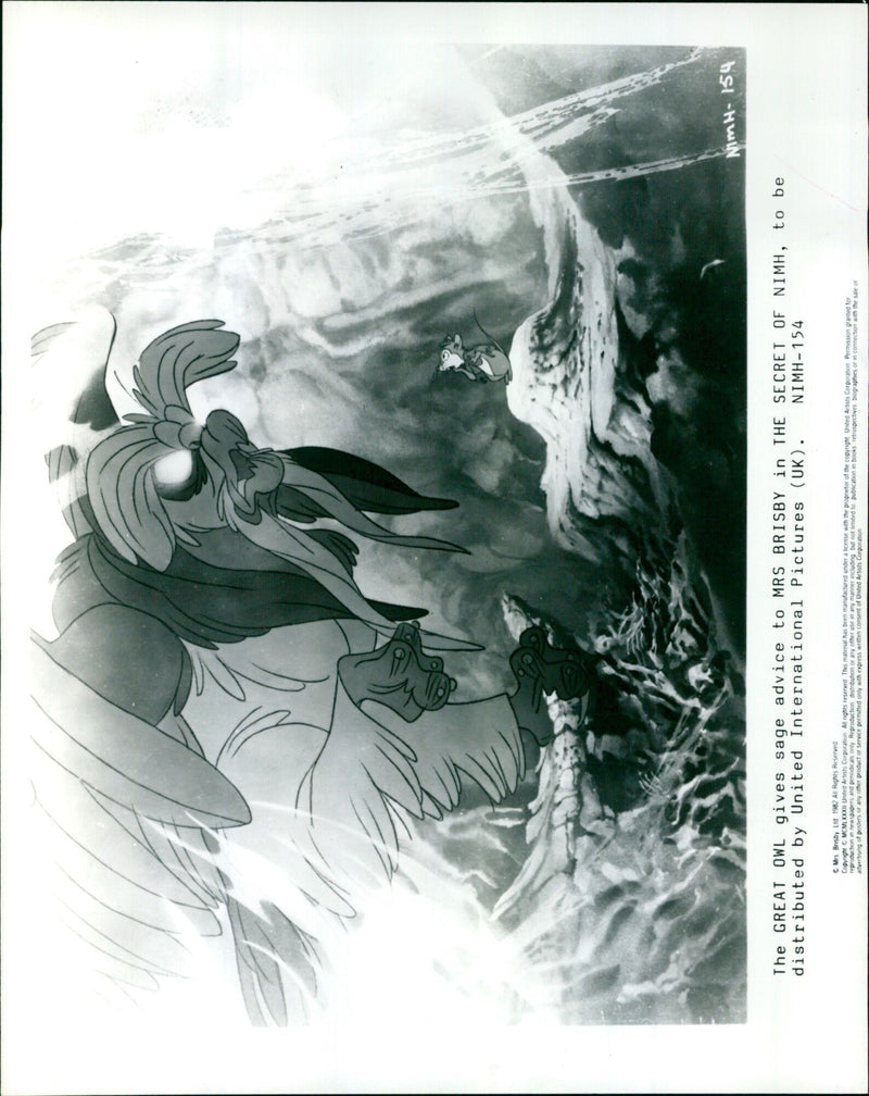 Mrs Brisby, a mouse, receives sage advice from the Great Owl in the 1982 animated film, 'The Secret of NIMH'. - Vintage Photograph