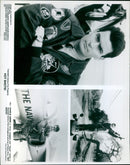 Cast members of Twentieth Century Fox's "Hot Shots!" film, including Charlie Sheen, are pictured on the set of the film. - Vintage Photograph