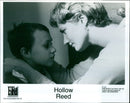 Joley Richardson and Sam Bould in a scene from the film "Hollow Reed". - Vintage Photograph