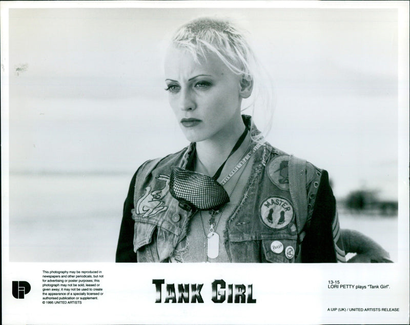 Actress Lori Petty in character as Tank Girl in the 1995 film "Tank Girl". - Vintage Photograph