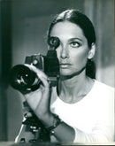 Actress Suzanne Pleshette stars as an undercover policewoman in the 1979 comedy film "Hot Stuff." - Vintage Photograph