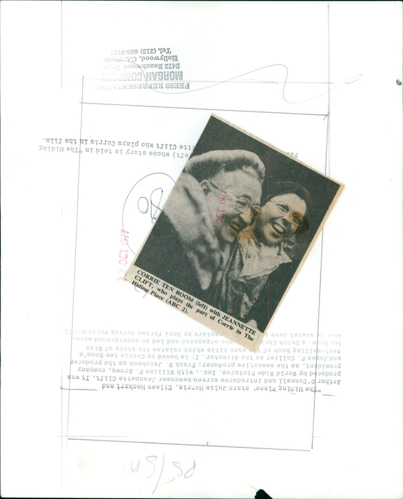 Cast members of the film "The Hiding Place" pose together at a press event. - Vintage Photograph