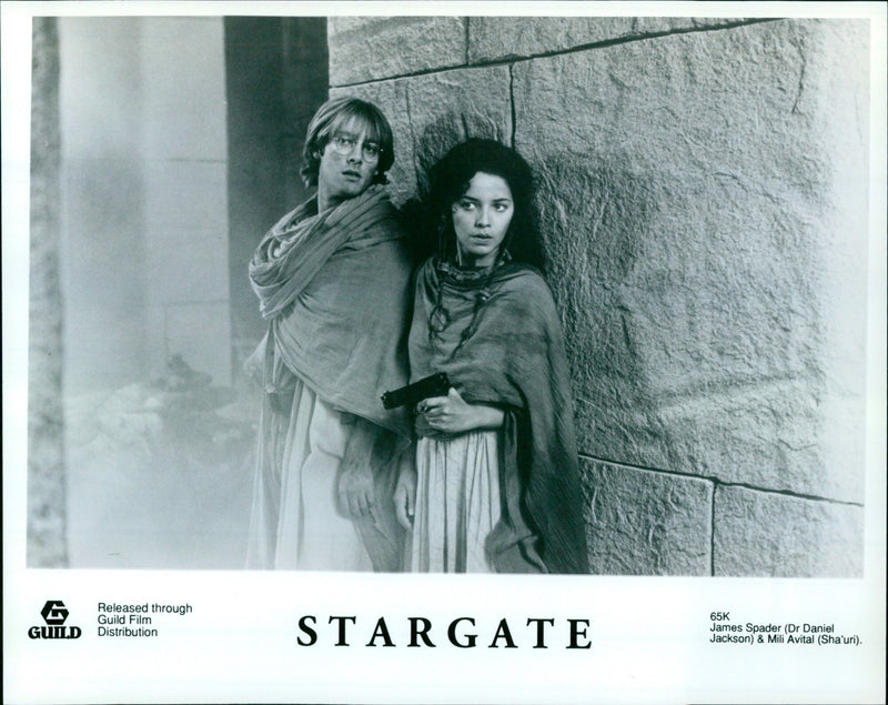 Actor James Spader and actress Mili Avital in a scene from Stargate. - Vintage Photograph