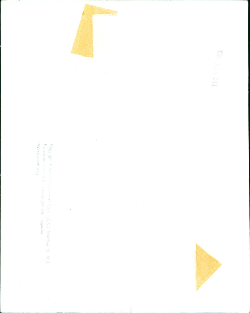 A crowd gathers in front of a movie theater in London, England. - Vintage Photograph