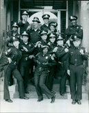 Police officers from the Police Academy film filming in Central London. - Vintage Photograph