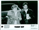 Chris Farley and Rob Lowe in a scene from the 1995 movie "Tommy Boy". - Vintage Photograph
