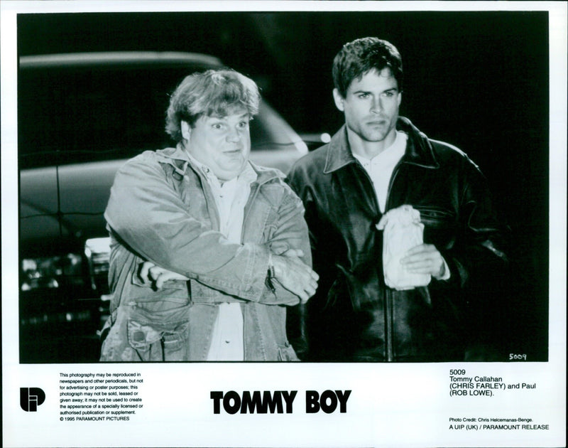 Chris Farley and Rob Lowe in a scene from the 1995 movie "Tommy Boy". - Vintage Photograph