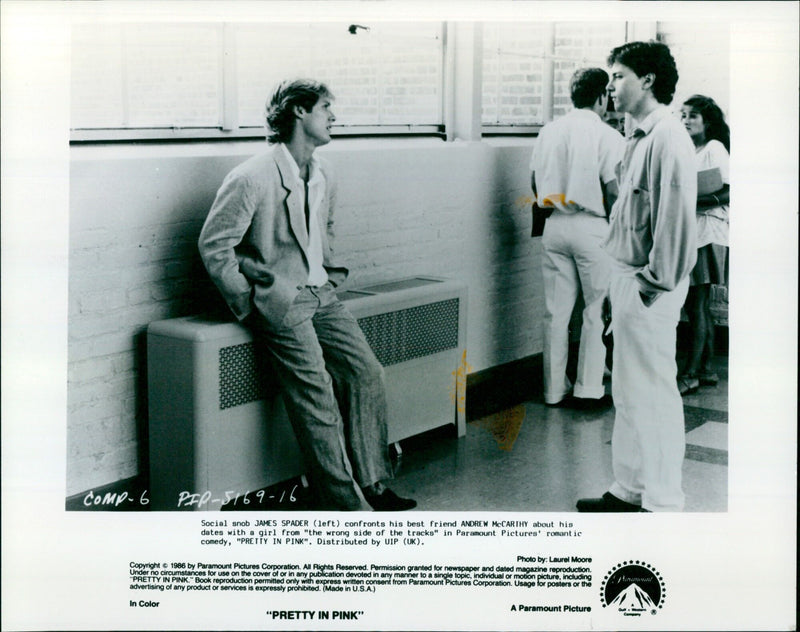 James Spader and Andrew McCarthy have an intense conversation in the romantic comedy "Pretty in Pink". - Vintage Photograph