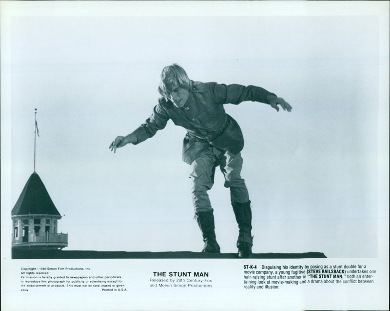 A young fugitive disguises his identity by posing as a stunt double on the set of the film, "The Stunt Man." - Vintage Photograph