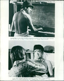 Pete (Walter Matthau) serenades his wife Tillie (Carol Burnett) in a scene from the movie "Pete'n'Tillie". - Vintage Photograph