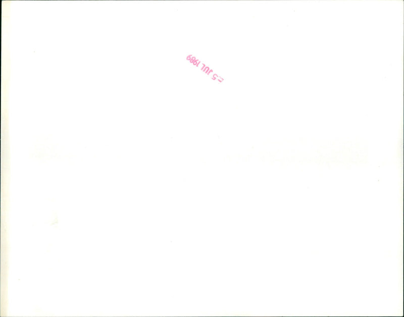 Arnold Schwarzenegger and Peter Boyle in a scene from the 1988 film "Red Heat". - Vintage Photograph