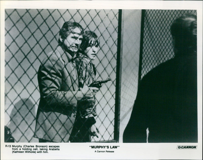 Charles Bronson and Kathleen Wilhoite in a scene from the movie "Murphy's Law". - Vintage Photograph