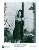 Actress Liv Tyler in a scene from the movie "Stealing Beauty." - Vintage Photograph