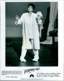 Actress Liza Minnelli steps out in a scene from the 1991 Paramount Pictures movie "Purumunt". - Vintage Photograph