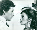 Robert Powell and Jane Seymour film a scene from the remake of The Four Feathers. - Vintage Photograph