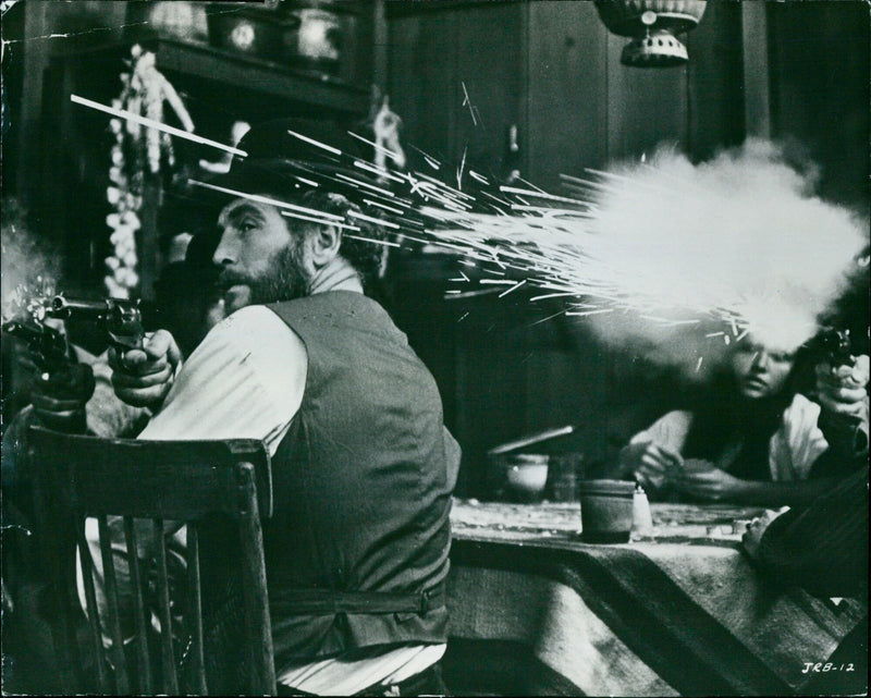 Paul Newman stars in the 1973 biographical film "The Life and Times of Judge Roy Bean," directed by John Huston. - Vintage Photograph