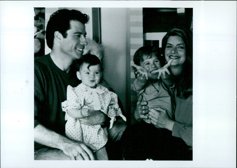 Kirstie Alley and John Travolta in a scene from the 1993 film "Look Who's Talking Too". - Vintage Photograph