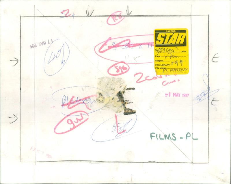 Sergeant Barnes (Tom Berenger) threatens a terrified Vietnamese girl (Li Thi Van) in the 1986 film Platoon. - Vintage Photograph