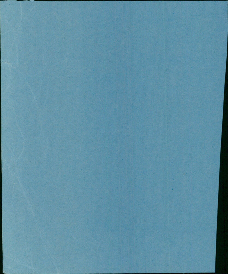 A large crowd gathers to watch the premiere of the film NA-NH in a city center. - Vintage Photograph