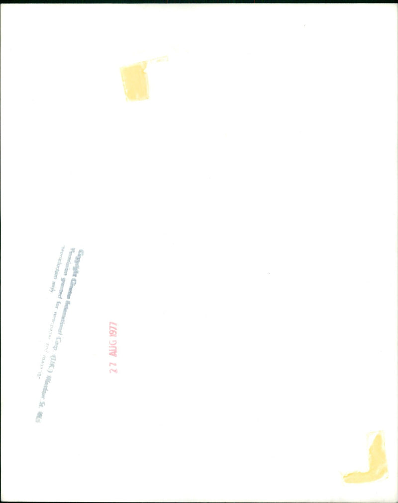 A crowd of people gathered outside a movie theater in London. - Vintage Photograph