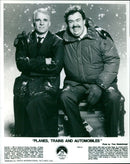 Steve Martin and John Candy star in the John Hughes film "Planes, Trains and Automobiles." - Vintage Photograph