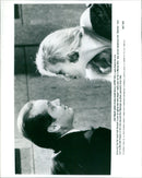 Jack Napier charms Alicia (played by Jerry Hall) in the 1989 film "Batman." - Vintage Photograph
