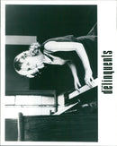 Singer Kylie Minogue on the set of the movie The Delinquents. - Vintage Photograph