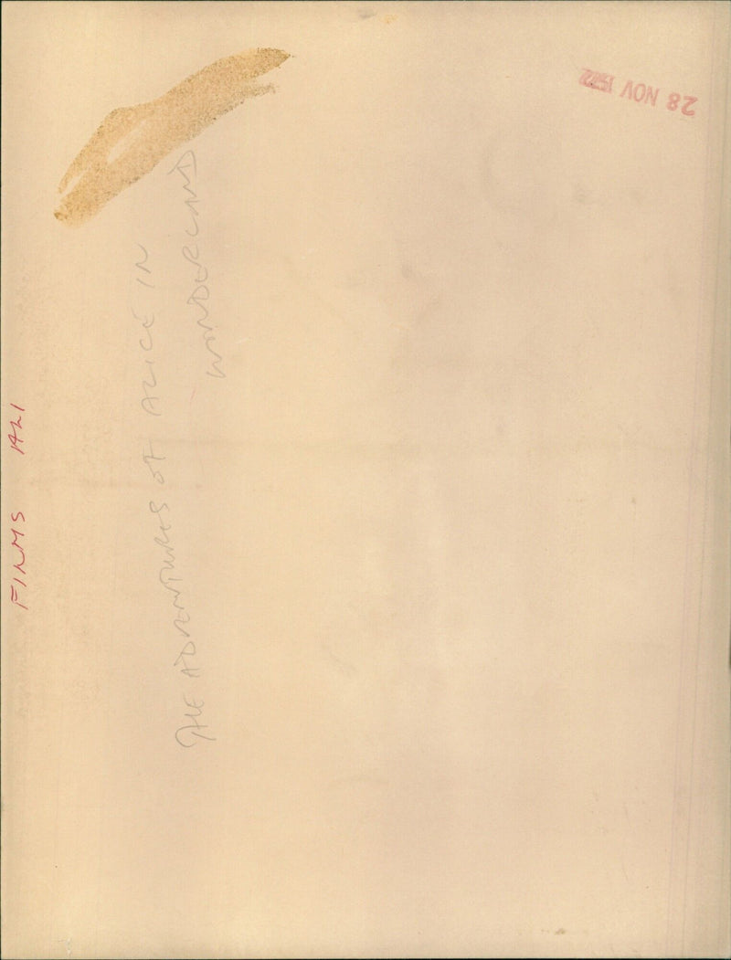 Three cast members from the 1972 film adaptation of Alice in Wonderland on the set. - Vintage Photograph