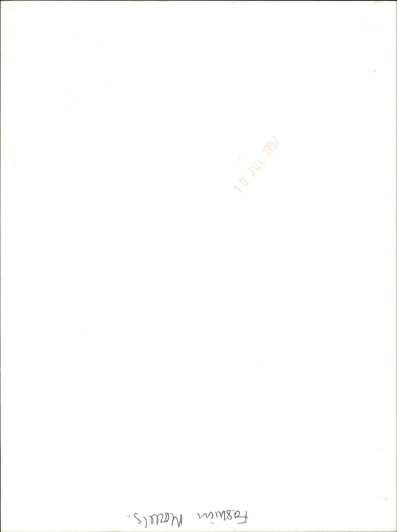 Fashion models pose on a runway at a fashion show in Paris. - Vintage Photograph