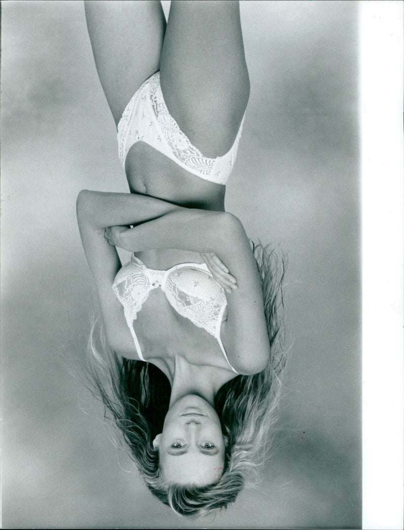 Models showcase the latest line of TASH-Underwear in a vivid underwater photoshoot. - Vintage Photograph