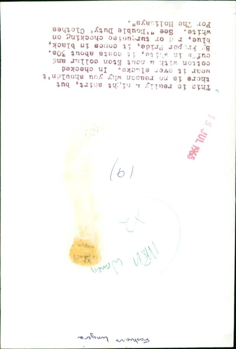 A man models a fashionable cotton checked shirt with an Eton collar and cuffs in white. - Vintage Photograph