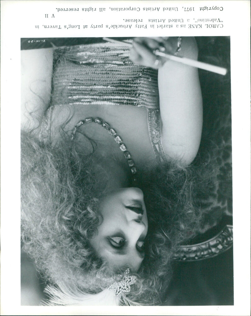 Actress Carol Kane attends a party at Long's Tavern in the film "Valentino." - Vintage Photograph