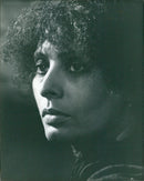 A group of people volunteering at a library blood drive. - Vintage Photograph