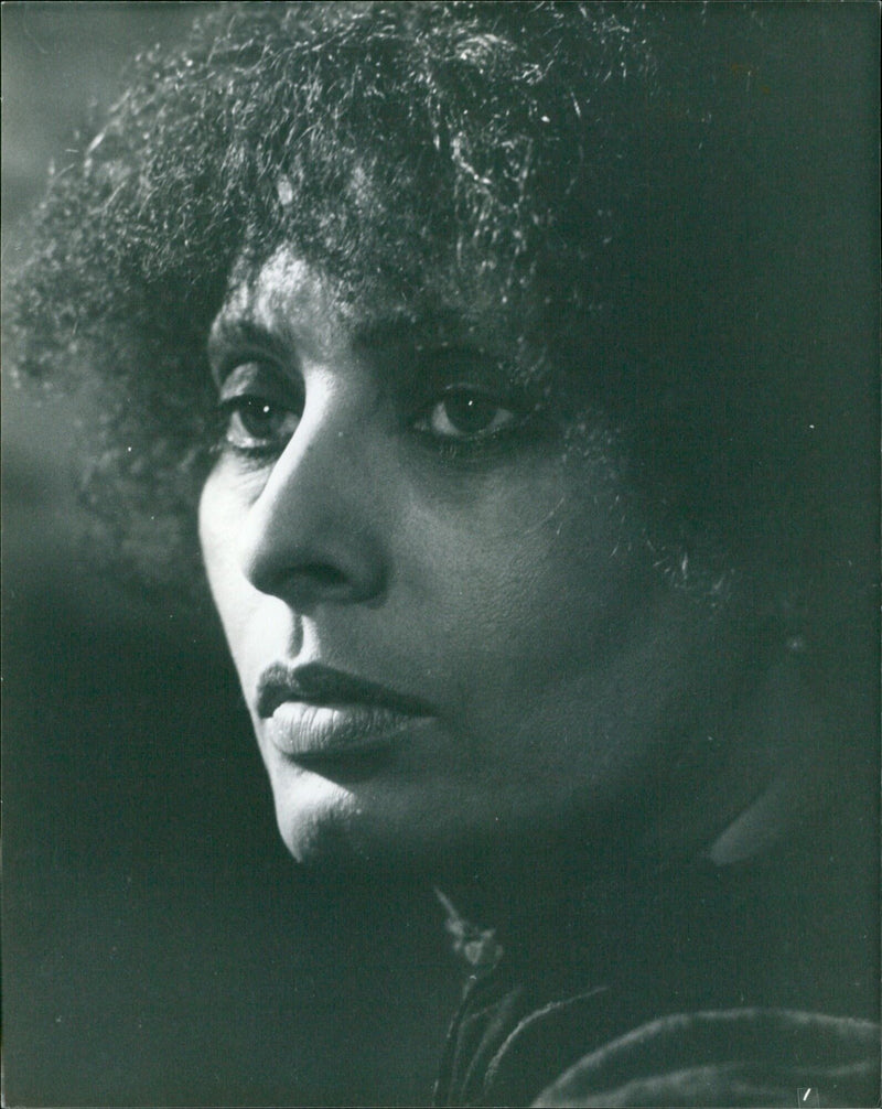 A group of people volunteering at a library blood drive. - Vintage Photograph