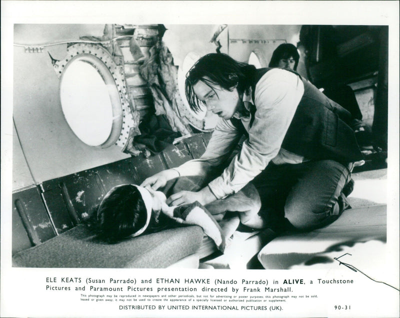Actors ELE KEATS (Susan Parrado) and ETHAN HAWKE (Nando Parrado) in the film ALIVE. - Vintage Photograph