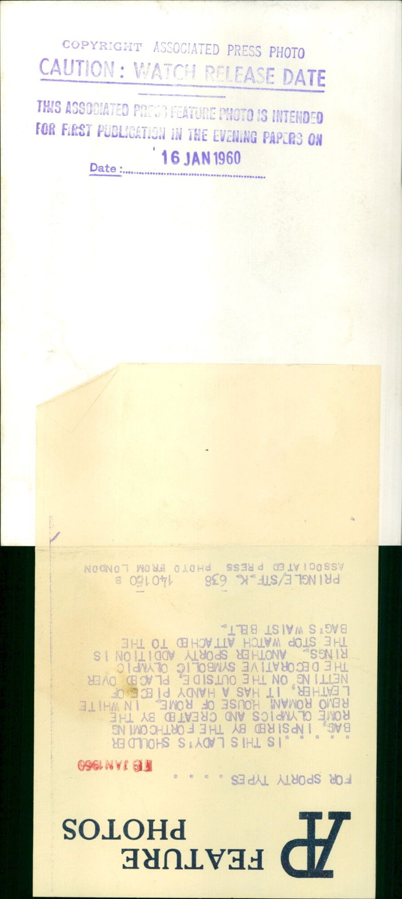 A unique handbag inspired by the 1960 Rome Olympics is modeled in London. - Vintage Photograph