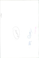 Chef Terry Lee serving up a plate of his signature dish, Curry 4+. - Vintage Photograph