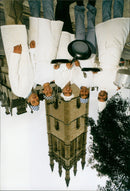 Chef Terry Lee serving up a plate of his signature dish, Curry 4+. - Vintage Photograph