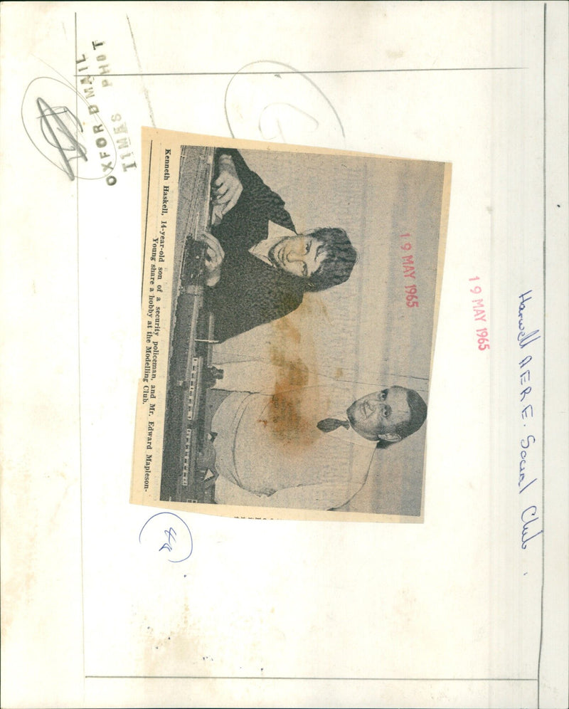 Kenneth Haskell and Mr. Edward Mapleson-Young share a hobby at the Modelling Club. - Vintage Photograph