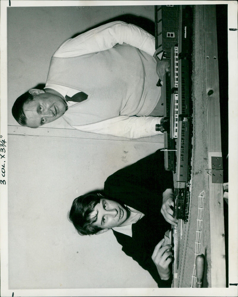 Kenneth Haskell and Mr. Edward Mapleson-Young share a hobby at the Modelling Club. - Vintage Photograph