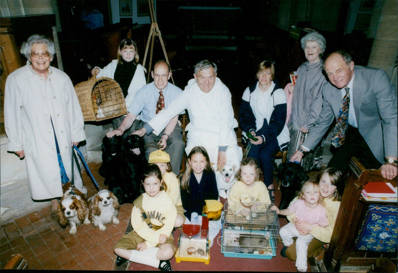 Parishioners and their pets attending the Blessing of the Animals service at Leafield Parish Church. - Vintage Photograph