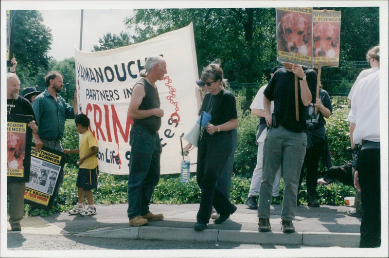 Animal rights protesters outside Yamanouchi Research Institute gates. - Vintage Photograph