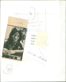 Singer-songwriter Buffy Sainte-Marie smiles during a press photo shoot. - Vintage Photograph